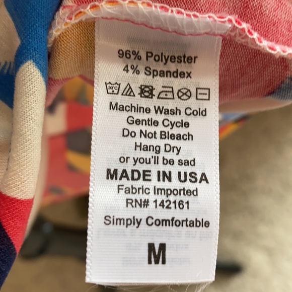 • Lularoe Irma Top • - Picture 5 of 6